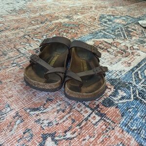 Birkenstock’s brown sandals